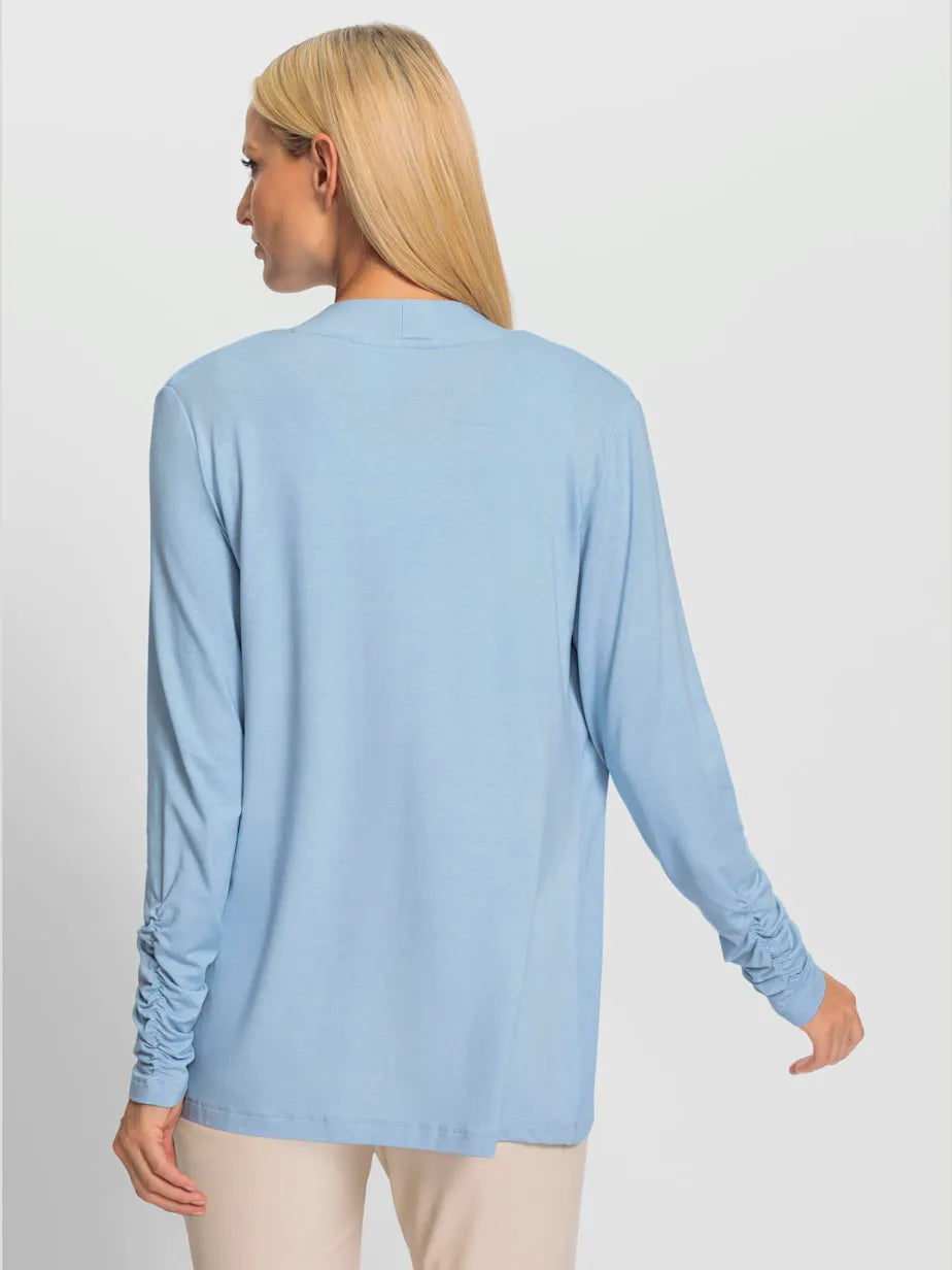 vest top with inscription in sequins and sleeves longues fluides