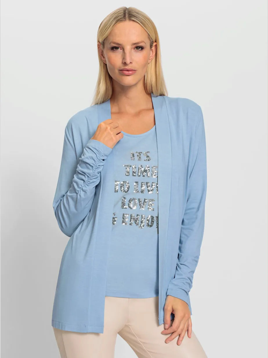 vest top with inscription in sequins and sleeves longues fluides