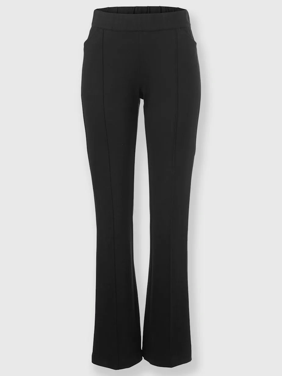 Tailleurs pantalons with collar with revers and sleeves bouffantes