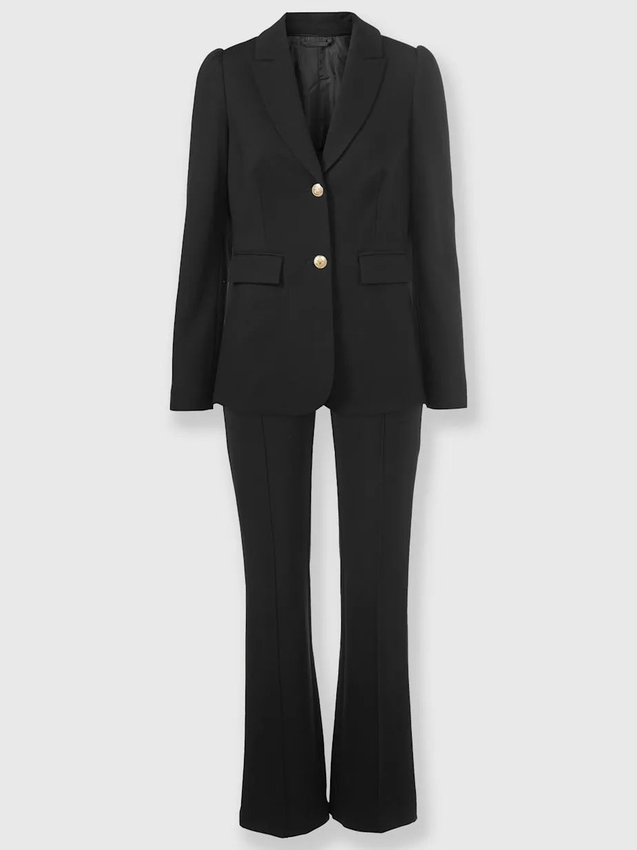 Tailleurs pantalons with collar with revers and sleeves bouffantes