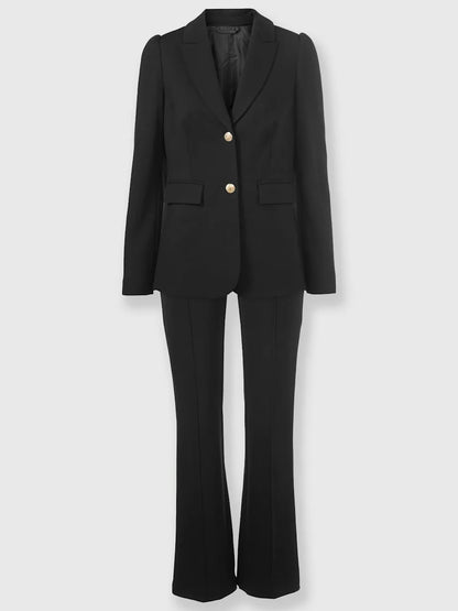 Tailleurs pantalons with collar with revers and sleeves bouffantes