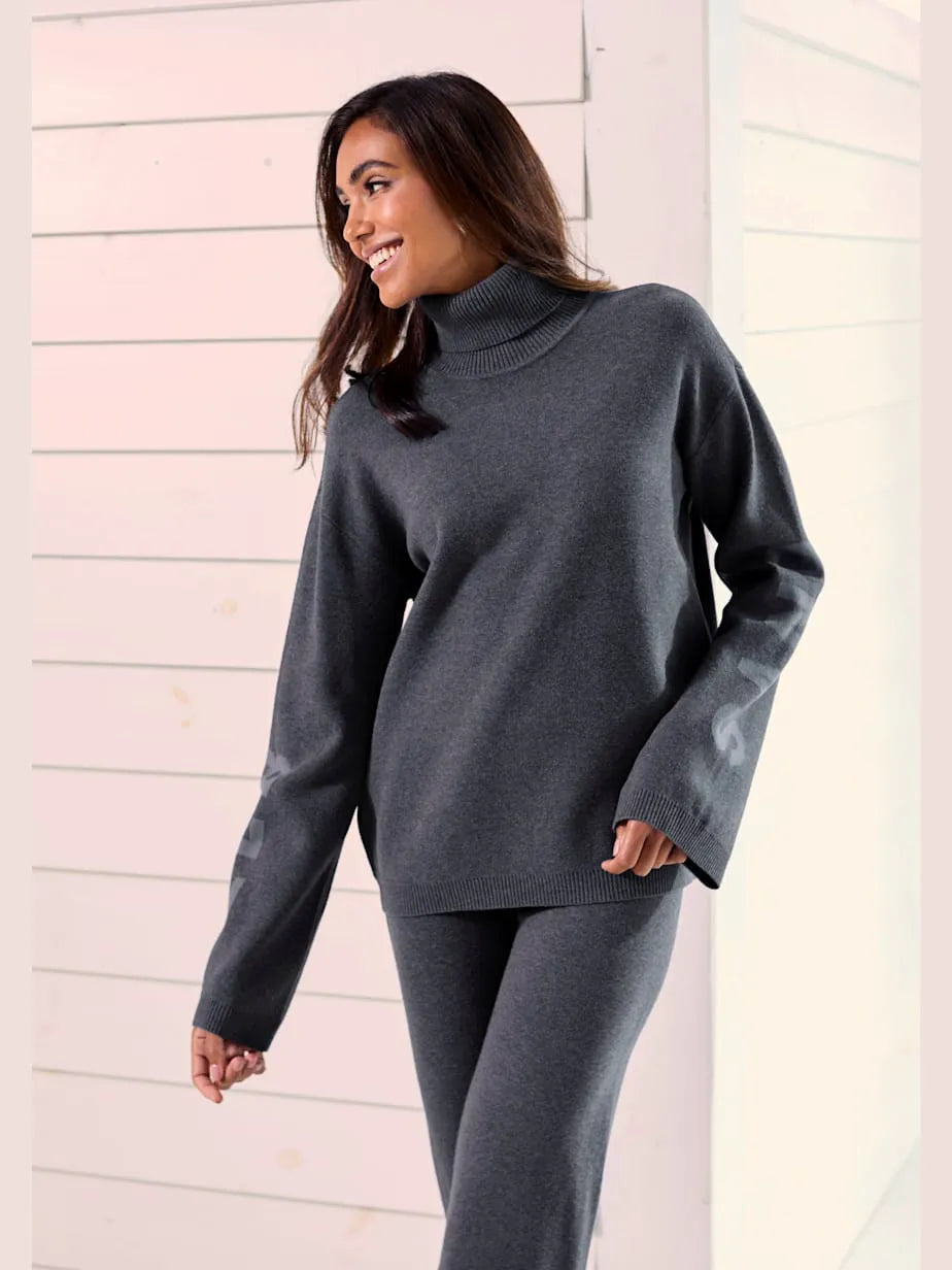 Sweater in tricot soft with collar rolled and sleeves longues